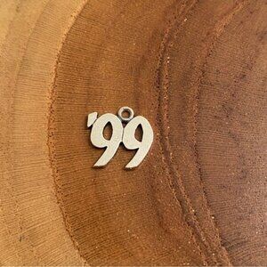 RETIRED James Avery ‘99 Charm, Sterling Silver